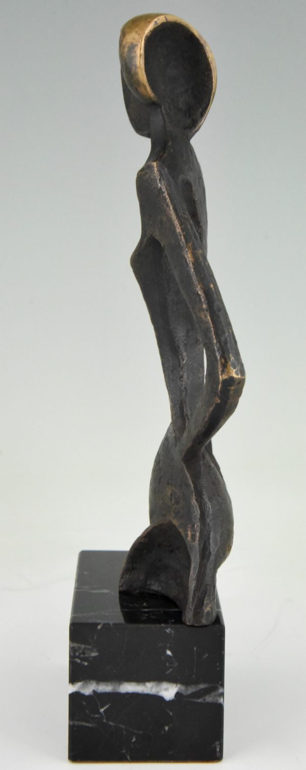 Modern bronze sculpture woman abstract