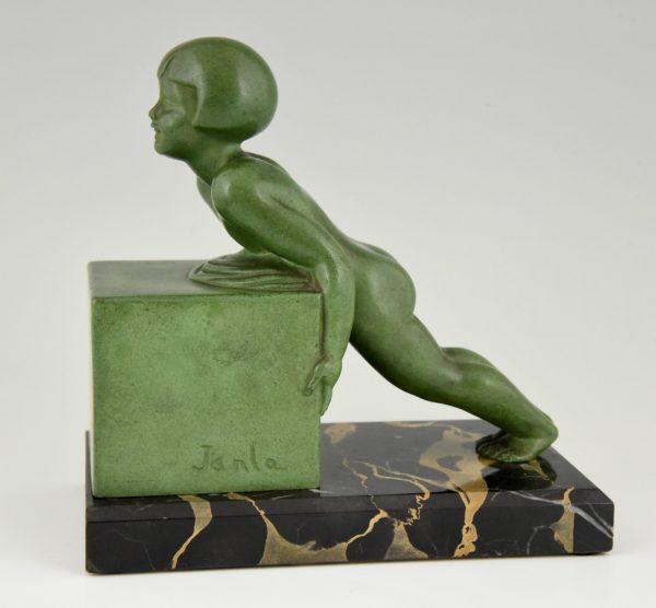 A pair of Art Deco child bookends.