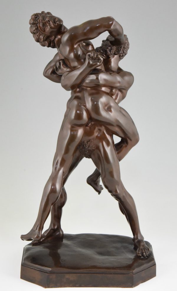 Antique bronze sculpture of Hercules and Antaeus wrestling