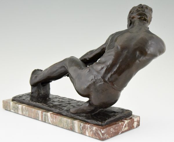 Art Deco sculpture bronze homme nu tirant une corde