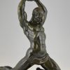 Art Deco sculpture bronze homme nu lançant une pierre.