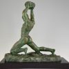 Art Deco bronzen beeld mannelijk naakt atleet met steen