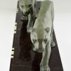 Art Deco sculpture of two walking panthers.