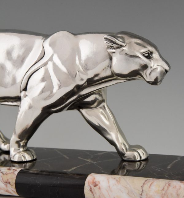 Art Deco silvered sculpture of a walking panther