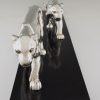 Art Deco silvered sculpture of two panthers