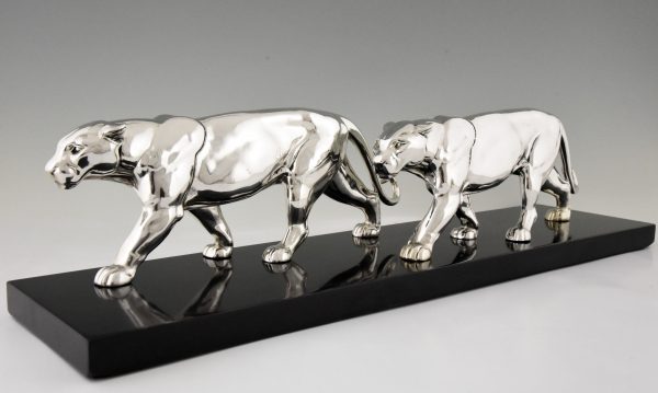 Art Deco silvered sculpture of two panthers