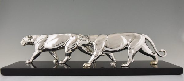 Art Deco silvered sculpture of two panthers