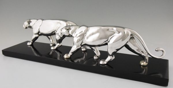 Art Deco silvered sculpture of two panthers