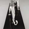 Art Deco silvered sculpture of two panthers