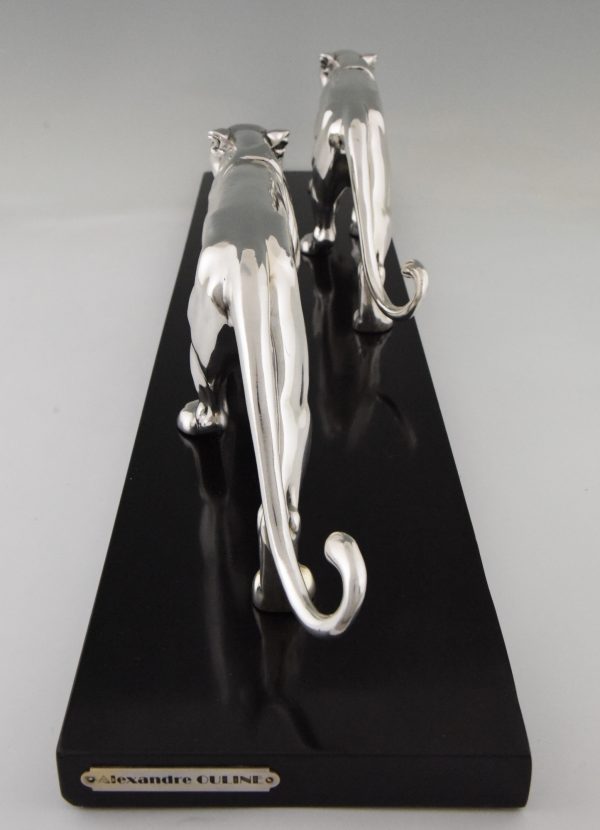 Art Deco silvered sculpture of two panthers