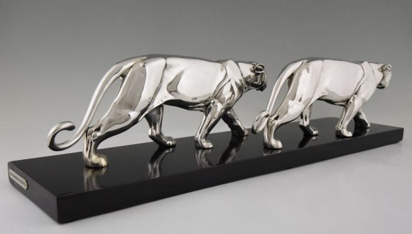 Art Deco silvered sculpture of two panthers