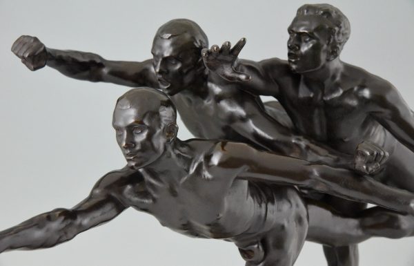 Antique bronze sculpture of 3 running athletes TO THE GOAL