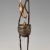 Art Deco bronzen sculptuur vogel op nest