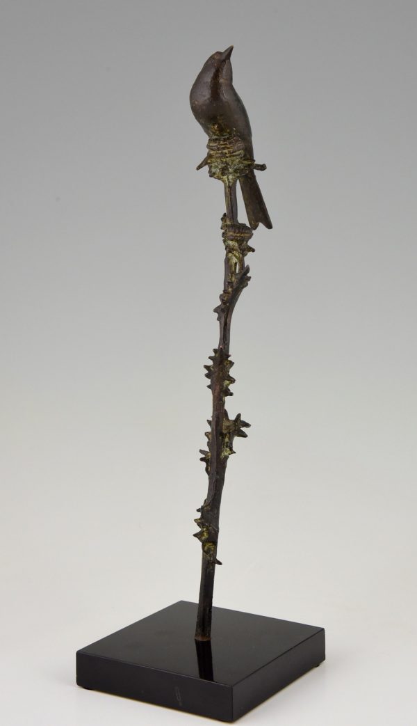 Art Deco bronze sculpture of a bird on a thistle