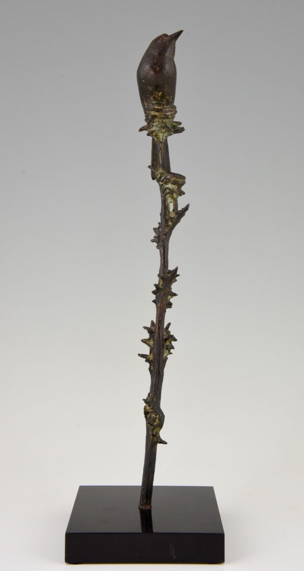 Art Deco bronze sculpture of a bird on a thistle