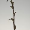 Art Deco bronzen sculptuur van een vogel op een distel