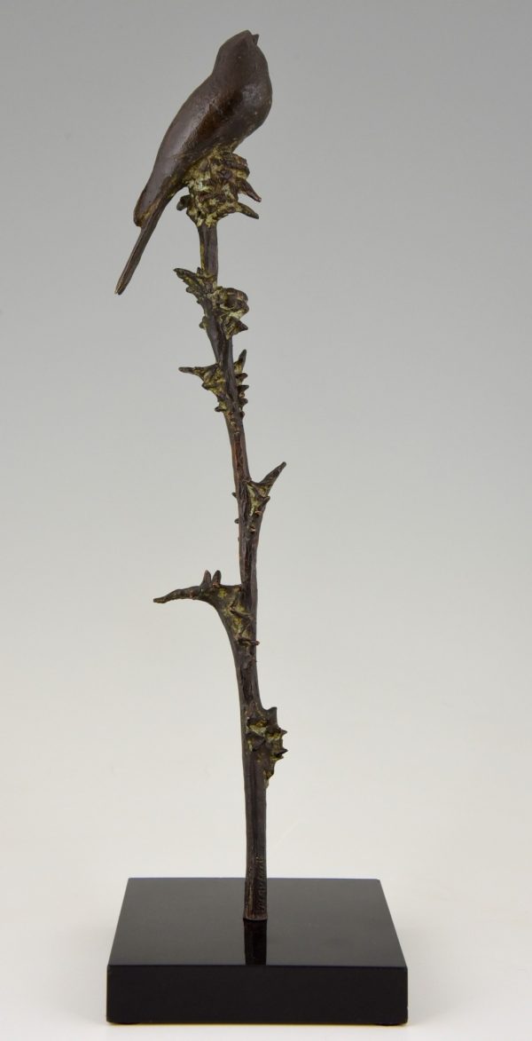 Art Deco bronzen sculptuur van een vogel op een distel