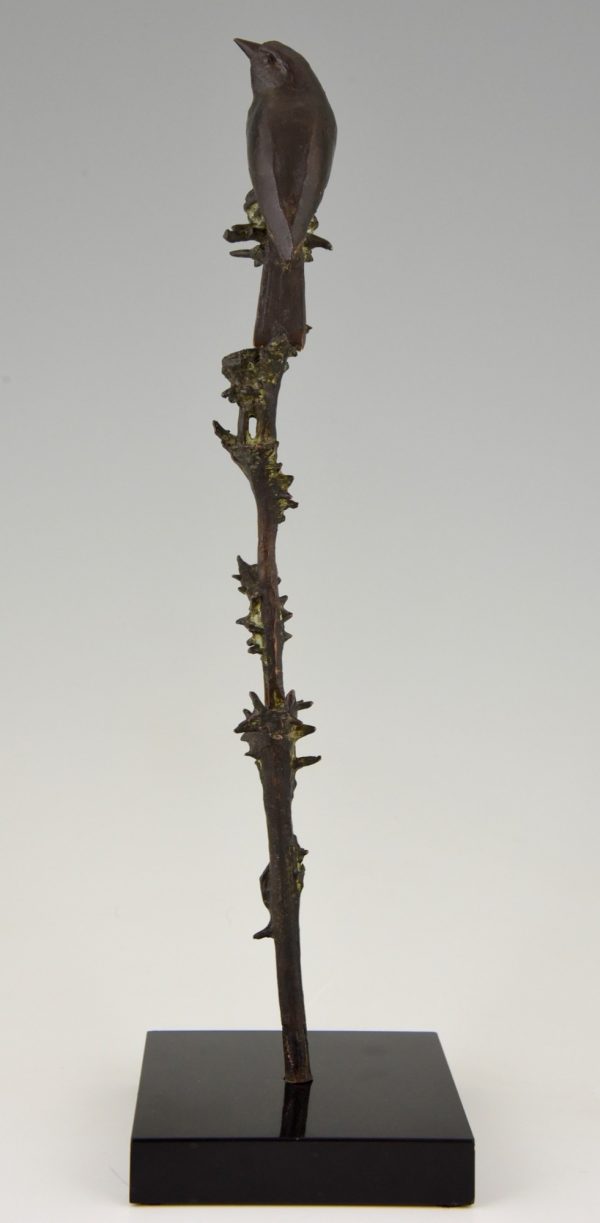 Art Deco bronze sculpture of a bird on a thistle