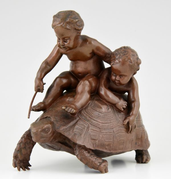 Sculpture en bronze 2 enfants sur une tortue