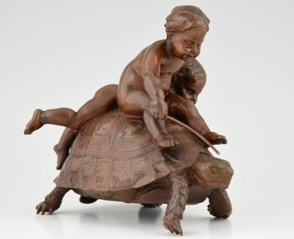 Sculpture en bronze 2 enfants sur une tortue