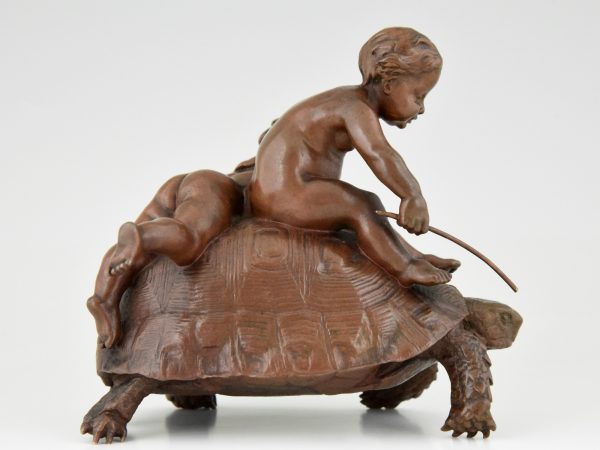 Antiek bronzen beeld 2 kindjes op een schildpad