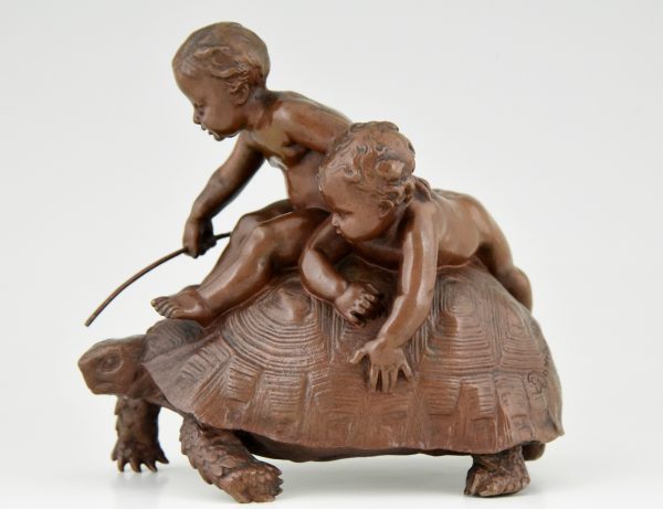 Sculpture en bronze 2 enfants sur une tortue