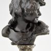 Antique bronze bust of a smiling child