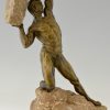 Antique bronze sculpture male nude with rock