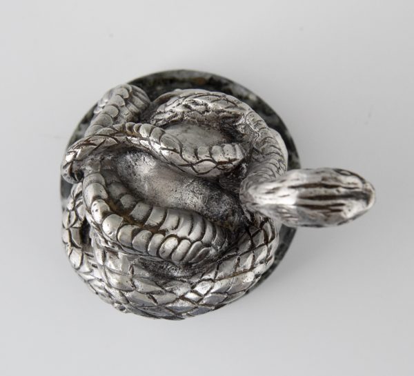 Snake silvered bronze car mascot.