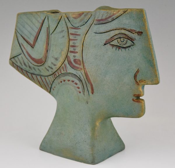 Ceramic vase in the shape of a womans head.