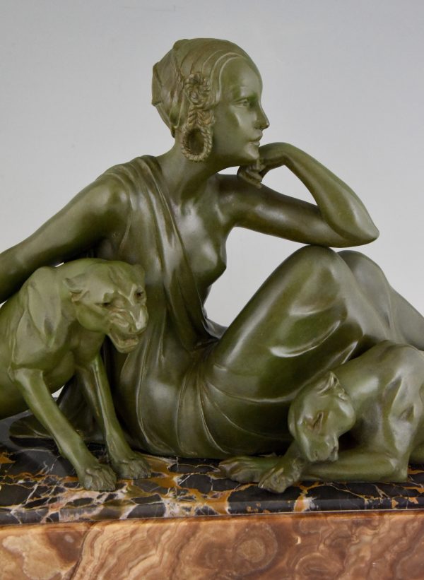 Art Deco sculpture lady with two panthers