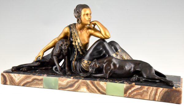 Art Deco sculpture lady with two panthers gold