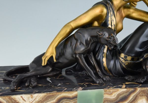 Art Deco sculpture lady with two panthers gold