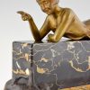 Art Deco bronze sculpture of a girl playing with a cat.