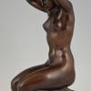 Bronze sculpture of a kneeling nude “Die Sinnende”