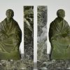 Art Deco bookends buddhist monks reading.