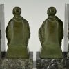 Art Deco bookends buddhist monks reading.