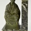 Art Deco bookends buddhist monks reading.