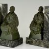 Art Deco bookends buddhist monks reading.