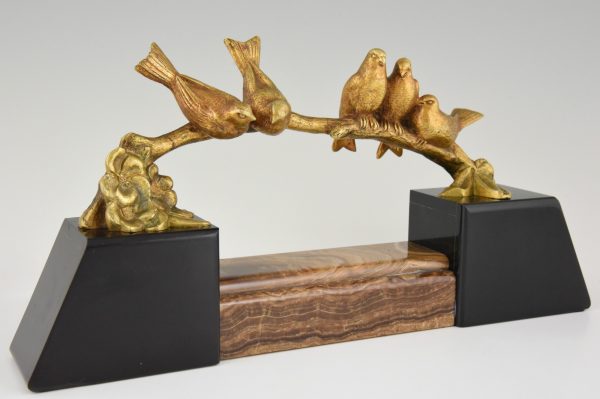 Art Deco bronzen beeld vogels op een tak.