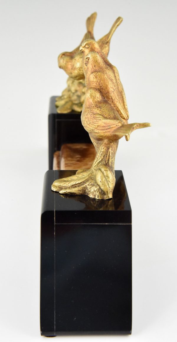 Art Deco bronzen beeld vogels op een tak.