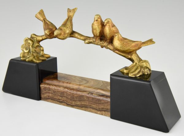 Art Deco bronzen beeld vogels op een tak.