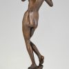 Art Deco bronze sculpture of a nude with flute.