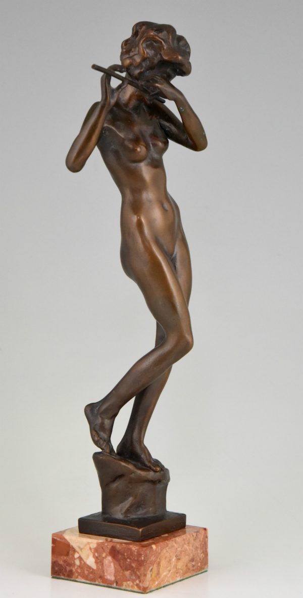 Sculpture Art Deco femme nue avec flute.