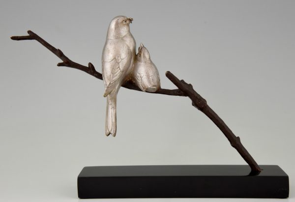 Sculpture en bronze Art Deco deux oiseaux sur une branche.