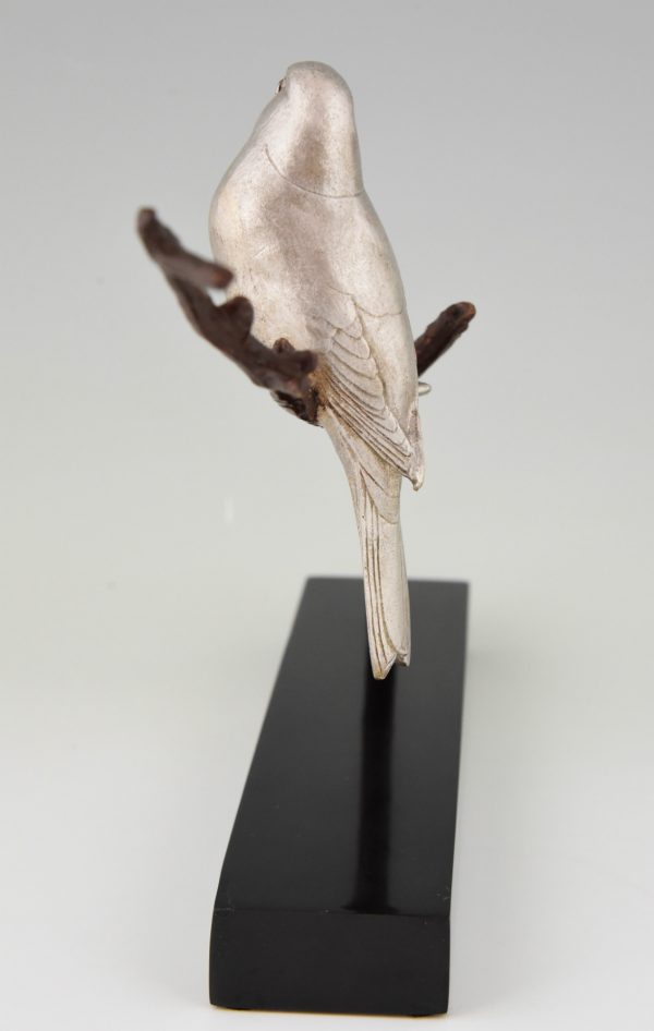 Art Deco bronze sculpture of two birds on a branch.