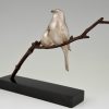 Sculpture en bronze Art Deco deux oiseaux sur une branche.