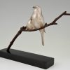 Art Deco bronzen beeld twee vogels op tak.