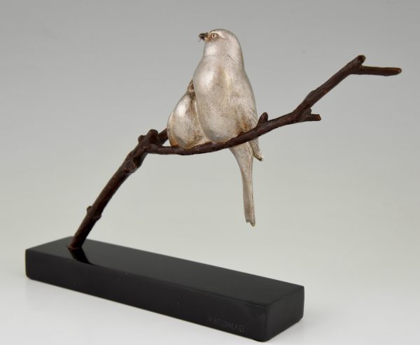 Sculpture en bronze Art Deco deux oiseaux sur une branche.