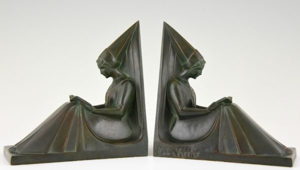 Art Deco figural bookends in the form of reading ladies.